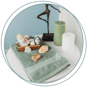 Massage table with candles and stones